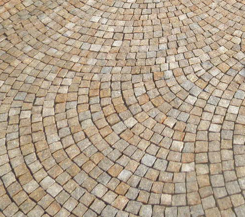 Adoquines de granito gris y amarillo